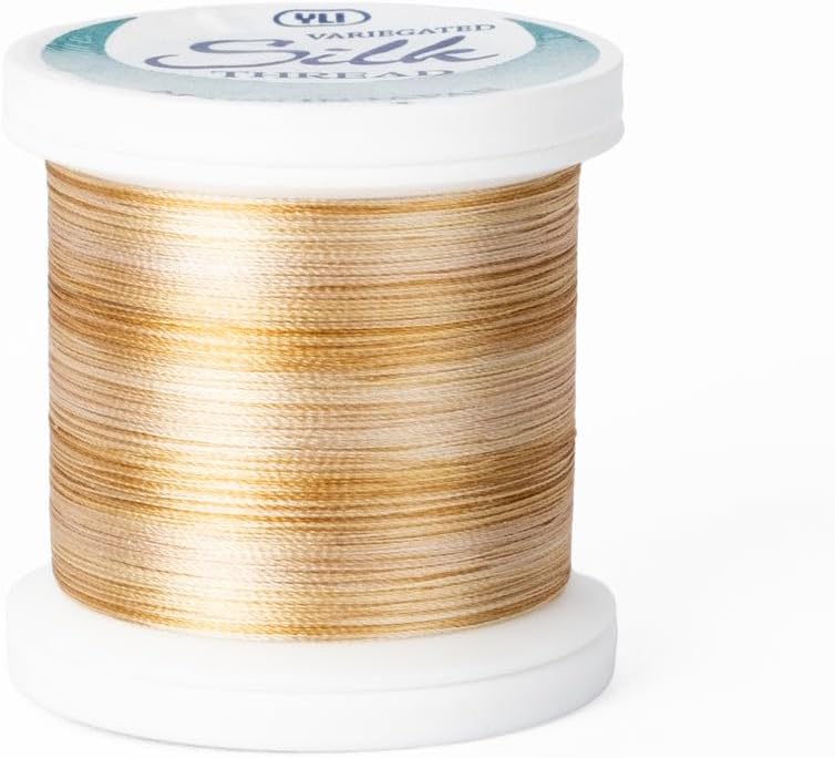 YLI Threads Silk Thread – 100 wt Fine Japanese Silk for Appliqué, EPP, and Quilting - Variegated Gold - Image 1